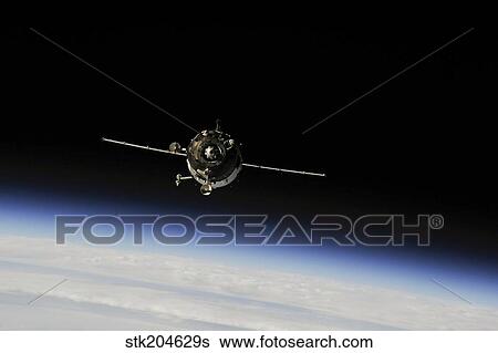 The Soyuz TMA-10M above Earth's limb. View Large Photo Image Stock Photograph - The Soyuz TMA-10M above Earth's limb.. Fotosearch