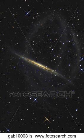 Stock Photograph - The Splinter Galaxy, also known as NGC 5907.. Fotosearch