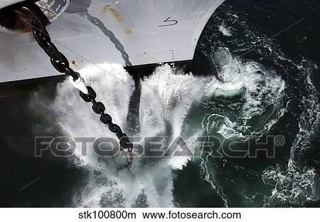 Picture - The starboard anchor of USS Ronald Reagan is released into the ocean.. Fotosearch