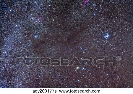 The Taurus region showing dark lanes of nebulosity. View Large Photo Image Stock Photograph - The Taurus region showing dark lanes of nebulosity.. Fotosearch