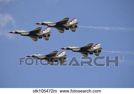 The U. S. Air Force Thunderbirds fly in formation. View Large Photo Image Picture - The U. S. Air Force Thunderbirds fly in formation.. Fotosearch