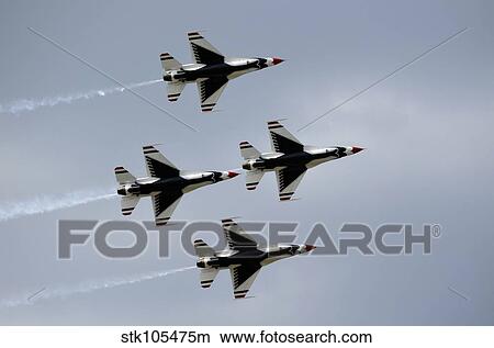 The U. S. Air Force Thunderbirds fly in formation. View Large Photo Image Picture - The U. S. Air Force Thunderbirds fly in formation.. Fotosearch