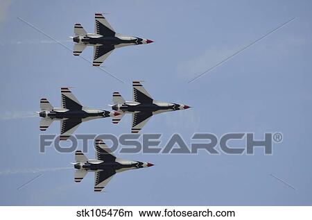 The U. S. Air Force Thunderbirds fly in formation. View Large Photo Image Picture - The U. S. Air Force Thunderbirds fly in formation.. Fotosearch