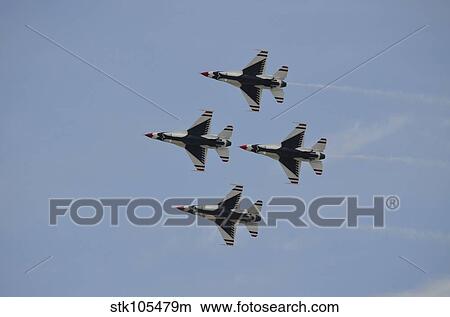 The U. S. Air Force Thunderbirds fly in formation. View Large Photo Image Picture - The U. S. Air Force Thunderbirds fly in formation.. Fotosearch