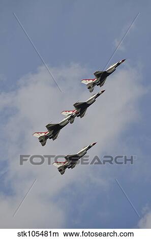 The U. S. Air Force Thunderbirds fly in formation. View Large Photo Image Picture - The U. S. Air Force Thunderbirds fly in formation.. Fotosearch