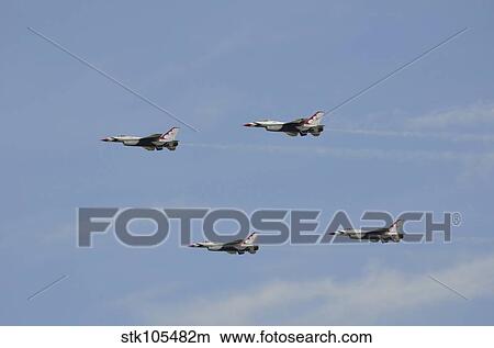 The U. S. Air Force Thunderbirds fly in formation. View Large Photo Image Picture - The U. S. Air Force Thunderbirds fly in formation.. Fotosearch
