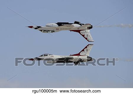 The U. S. Air Force Thunderbirds in calypso pass formation. View Large Photo Image Picture - The U. S. Air Force Thunderbirds in calypso pass formation.. Fotosearch