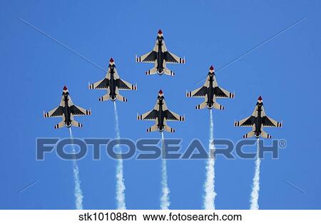 The U. S. Air Force Thunderbirds perform a 6-ship formation flyby during an air show. View Large Photo Image Picture - The U. S. Air Force Thunderbirds perform a 6-ship formation flyby during an air show.. Fotosearch