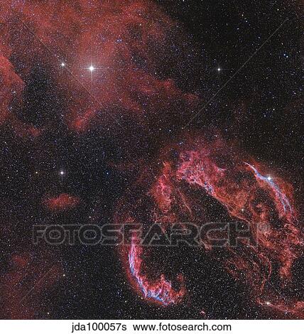 The Veil Nebula in the constellation Cygnus glows red. View Large Photo Image Stock Photograph - The Veil Nebula in the constellation Cygnus glows red.. Fotosearch
