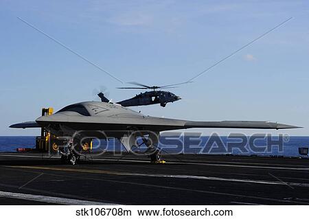 The X-47B Unmanned Combat Air System aboard USS Harry S. Truman. View Large Photo Image Picture - The X-47B Unmanned Combat Air System aboard USS Harry S. Truman.. Fotosearch