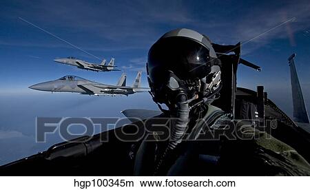 Three F-15 Eagles fly high during a training mission. View Large Photo Image Picture - Three F-15 Eagles fly high during a training mission.. Fotosearch