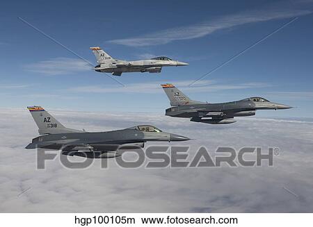 Three F-16's fly in formation over Arizona. View Large Photo Image Picture - Three F-16's fly in formation over Arizona.. Fotosearch