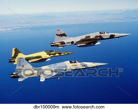 Three F-5E Tiger II fighter aircraft in flight. View Large Photo Image Picture - Three F-5E Tiger II fighter aircraft in flight.. Fotosearch