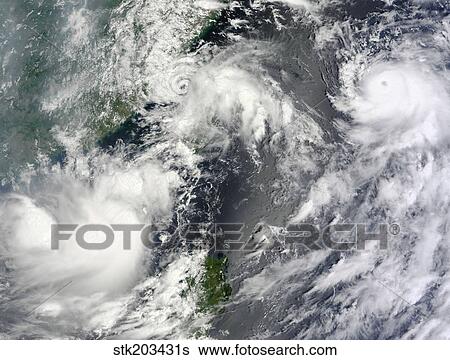 Three strong storms churn in the Pacific Ocean Basin off the Asian coast. View Large Photo Image Stock Photograph - Three strong storms churn in the Pacific Ocean Basin off the Asian coast.. Fotosearch