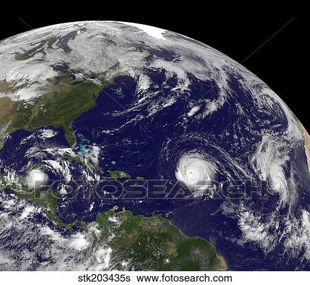 Three tropical cyclones active in the Atlantic Ocean basin. View Large Photo Image Stock Photograph - Three tropical cyclones active in the Atlantic Ocean basin.. Fotosearch