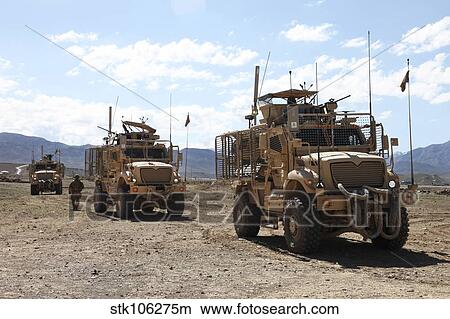 Three U. S. Army Mine Resistant Ambush Protected vehicles. View Large Photo Image Picture - Three U. S. Army Mine Resistant Ambush Protected vehicles.. Fotosearch