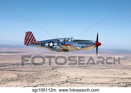 Picture - TP-51C Mustang over the central Arizona desert.. Fotosearch