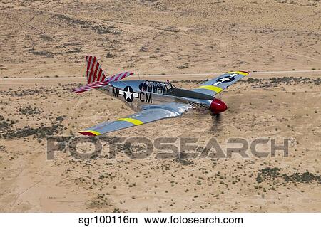 Picture - TP-51C Mustang over the central Arizona desert.. Fotosearch