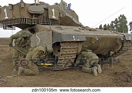 Track replacement on a Israel Defense Force Merkava Mark IV main battle tank. View Large Photo Image Picture - Track replacement on a Israel Defense Force Merkava Mark IV main battle tank.. Fotosearch