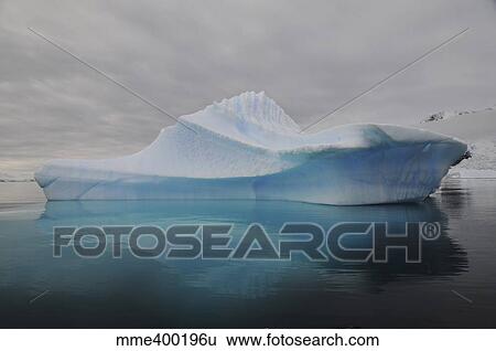 Translucent blue iceberg reflection, Antarctica. View Large Photo Image Stock Photograph - Translucent blue iceberg reflection, Antarctica.. Fotosearch