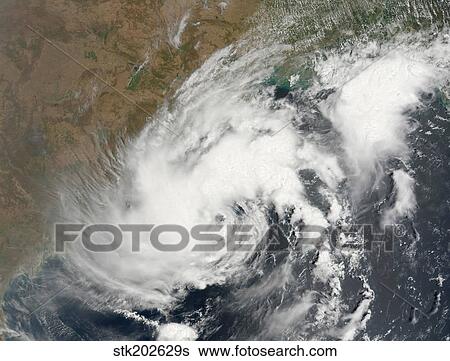 Stock Photograph - Tropical Storm Bijli draped the east coast of India.. Fotosearch