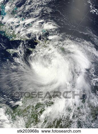 Stock Photograph - Tropical Storm Isaac moving through the eastern Caribbean Sea.. Fotosearch