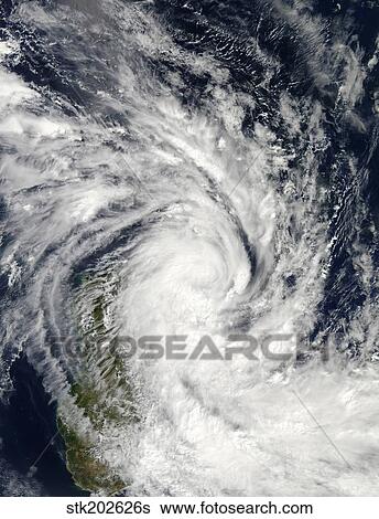 Stock Photograph - Tropical Storm Jade coming ashore over Madagascar.. Fotosearch