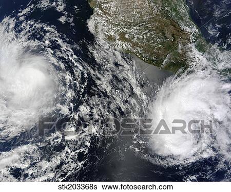 Tropical Storms Blas and Celia circulate in close proximity to each other in this satellite view. View Large Photo Image Stock Photograph - Tropical Storms Blas and Celia circulate in close proximity to each other in this satellite view.. Fotosearch