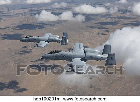 Picture - Two A-10 Thunderbolt's fly over the Saylor Creek bombing range, Idaho.. Fotosearch