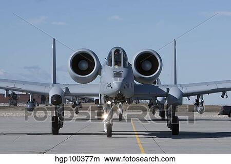 Two A-10 Thunderbolt's taxi to the runway. View Large Photo Image Picture - Two A-10 Thunderbolt's taxi to the runway.. Fotosearch