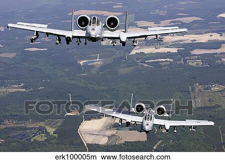 Two A-10C Thunderbolt aircraft near Moody Air Force Base, Georgia. View Large Photo Image Picture - Two A-10C Thunderbolt aircraft near Moody Air Force Base, Georgia.. Fotosearch