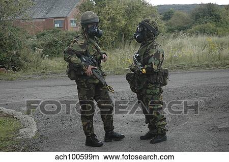 Two British soldiers in full NBC protection gear. View Large Photo Image Picture - Two British soldiers in full NBC protection gear.. Fotosearch