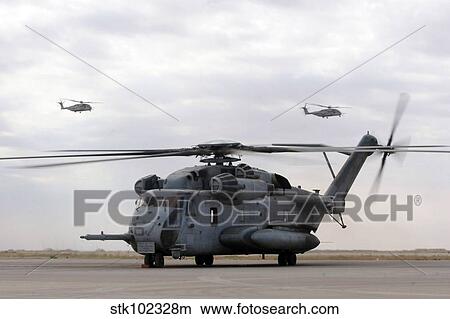 Two CH-53E Super Stallion helicopters depart Al Asad Air Base, Iraq. View Large Photo Image Picture - Two CH-53E Super Stallion helicopters depart Al Asad Air Base, Iraq.. Fotosearch