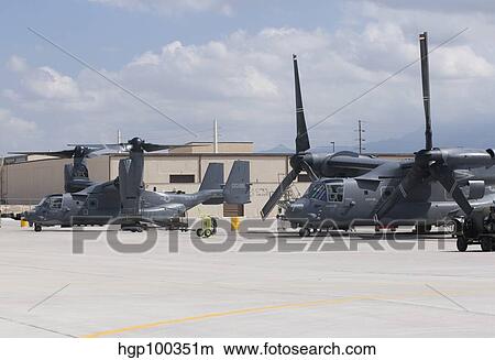 Two CV-22 Osprey aircraft on the ramp at Kirtland Air Force Base. View Large Photo Image Picture - Two CV-22 Osprey aircraft on the ramp at Kirtland Air Force Base.. Fotosearch