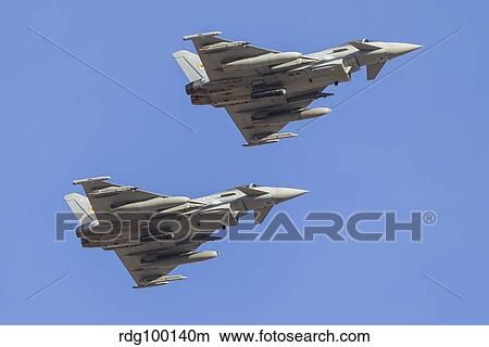 Two Eurofighter Typhoon FGR4 fighters of the Royal Air Force. View Large Photo Image Picture - Two Eurofighter Typhoon FGR4 fighters of the Royal Air Force.. Fotosearch