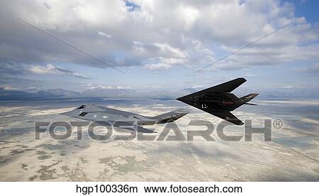 Two F-117 Nighthawk stealth fighters in flight over New Mexico. View Large Photo Image Picture - Two F-117 Nighthawk stealth fighters in flight over New Mexico.. Fotosearch