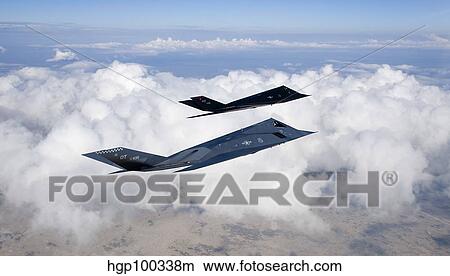 Two F-117 Nighthawk stealth fighters in flight over New Mexico. View Large Photo Image Picture - Two F-117 Nighthawk stealth fighters in flight over New Mexico.. Fotosearch