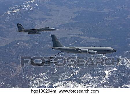 Picture - Two F-15 Eagles conduct aerial refueling with a KC-135 Stratotanker.. Fotosearch