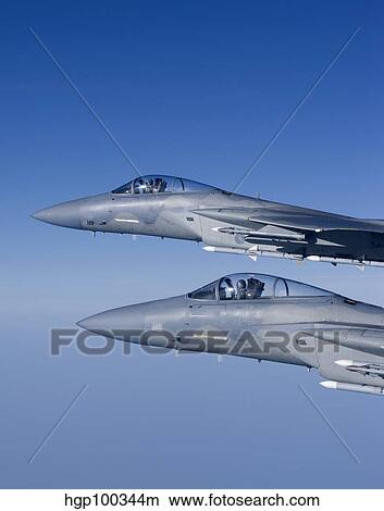 Picture - Two F-15 Eagles fly over New England during a training mission.. Fotosearch