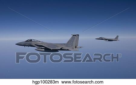 Two F-15 Eagles fly over the Gulf of Mexico. View Large Photo Image Picture - Two F-15 Eagles fly over the Gulf of Mexico.. Fotosearch