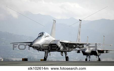 Two F-15A Eagles on the flight line. View Large Photo Image Picture - Two F-15A Eagles on the flight line.. Fotosearch