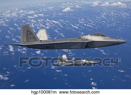 Two F-22 Raptors fly in formaton over Japan. View Large Photo Image Picture - Two F-22 Raptors fly in formaton over Japan.. Fotosearch