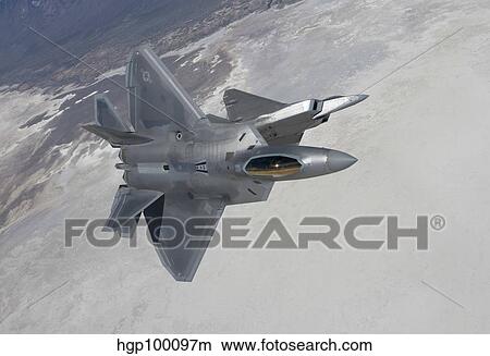 Picture - Two F-22 Raptors maneuver while on a training mission over New Mexico.. Fotosearch