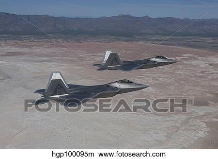 Picture - Two F-22 Raptors on a training mission over New Mexico.. Fotosearch