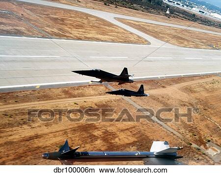 Two F-5E Tiger II fighter aircraft seconds after takeoff. View Large Photo Image Picture - Two F-5E Tiger II fighter aircraft seconds after takeoff.. Fotosearch