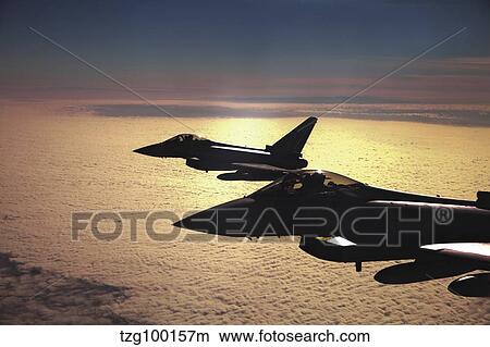 Two German Air Force Eurofighter Typhoon's over France. View Large Photo Image Picture - Two German Air Force Eurofighter Typhoon's over France.. Fotosearch