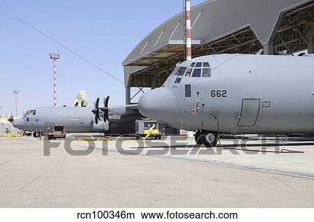 Two Israeli Air Force C-130J Shimshon aircraft parked at Nevatim Airbase. View Large Photo Image Picture - Two Israeli Air Force C-130J Shimshon aircraft parked at Nevatim Airbase.. Fotosearch