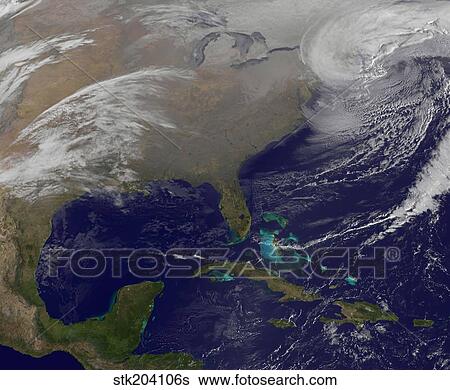 Stock Photograph - Two low pressure systems merge together and form a giant nor'easter.. Fotosearch