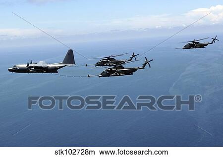 Two MH-53 Pave Low helicopters refueling. View Large Photo Image Picture - Two MH-53 Pave Low helicopters refueling.. Fotosearch