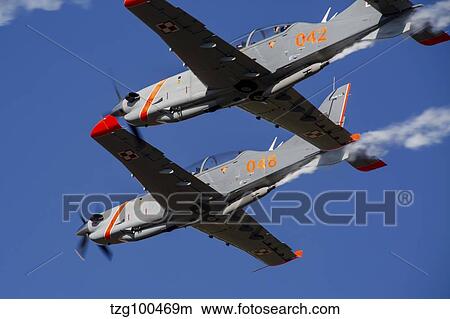 Picture - Two PZL-130 Orlik trainers of the Polish Air Force in flight.. Fotosearch